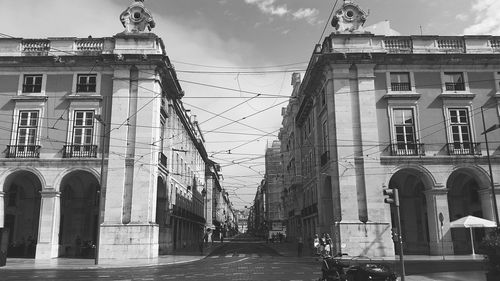 Low angle view of buildings against sky in city