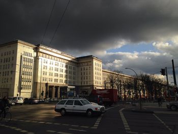 City street against cloudy sky