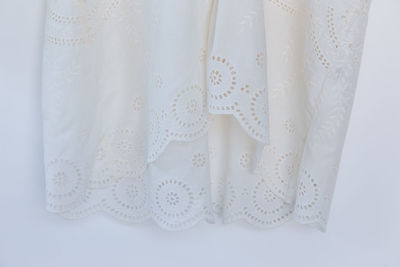 Close-up of clothing against white background