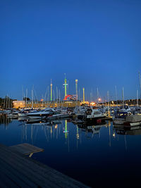 Boats in harbor amusement park background 