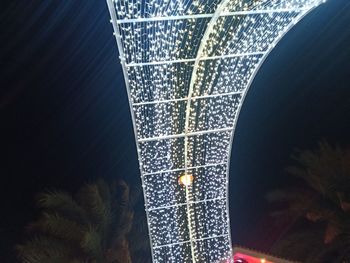 High angle view of illuminated lighting equipment against sky