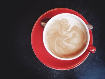 High angle view of cappuccino on table