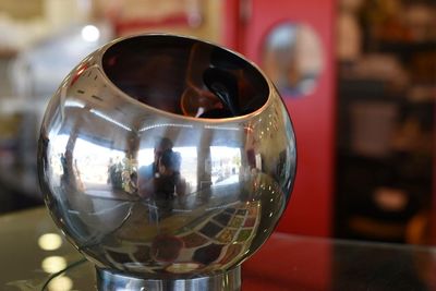 Close-up of wine glass on table in restaurant