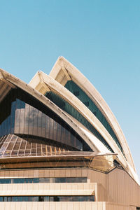 Low angle view of building against blue sky