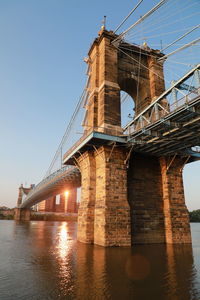 Low angle view of bridge over river