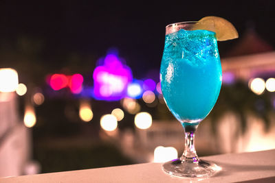 Close-up of cocktail glass on table