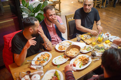 High angle view of people eating food