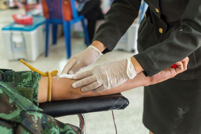 Cropped image of man donating blood