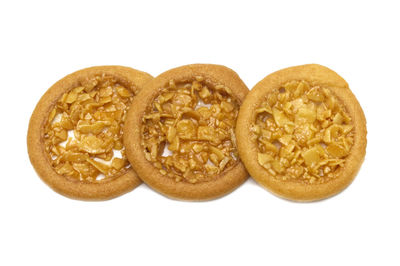 Close-up of bread against white background