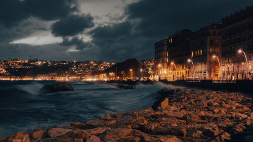 Scenic view of sea against sky at night