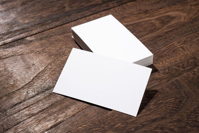 High angle view of white paper on table