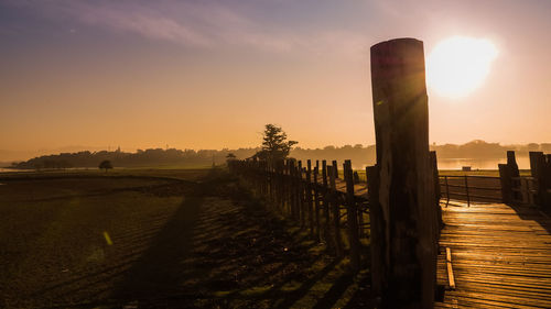 Scenic view of landscape against sky during sunset