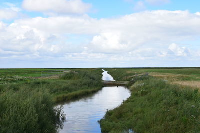 Scenic view of land against sky