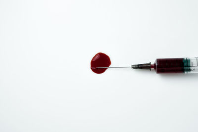 Close-up of umbrella against white background