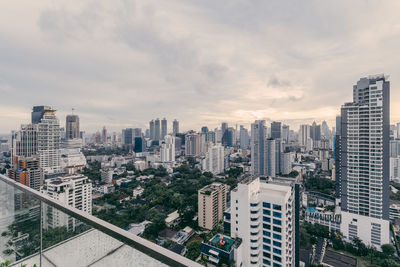 High angle view of buildings in city against sky