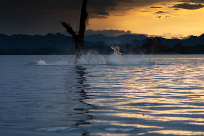 Scenic view of sea against sky during sunset