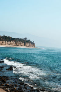 Scenic view of sea against clear sky