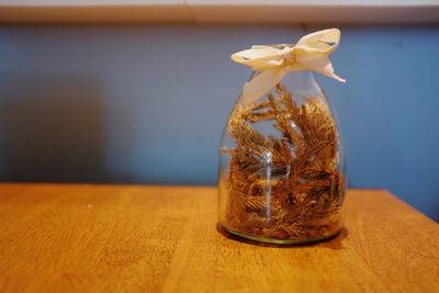 Close-up of glass vase on table