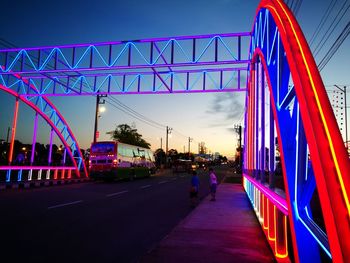 View of bridge against blue sky at night