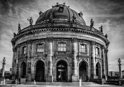 View of historic building against cloudy sky