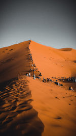 Scenic view of desert against clear sky