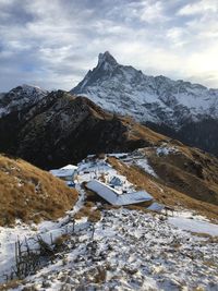 Scenic view of mountains against sky during winter