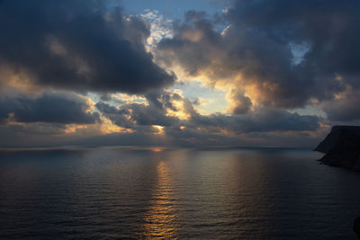 Scenic view of sea against sky during sunset