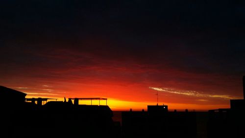 Silhouette of buildings at sunset