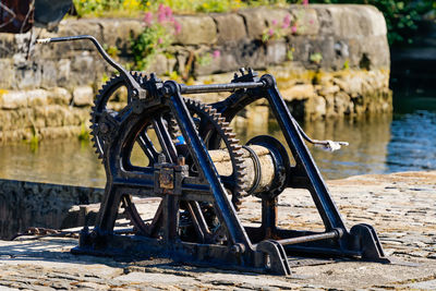 Metallic structure by river in park