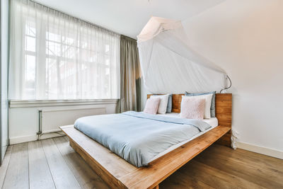 High angle view of bed in bedroom