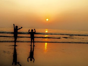 Scenic view of sea at sunset