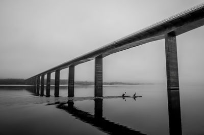 The vejle fjord bridge in foggy weather, denmark