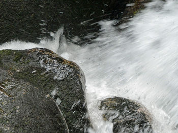 High angle view of waterfall in sea