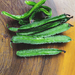 High angle view of winged bean on table