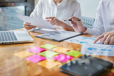 Business people working at desk in office