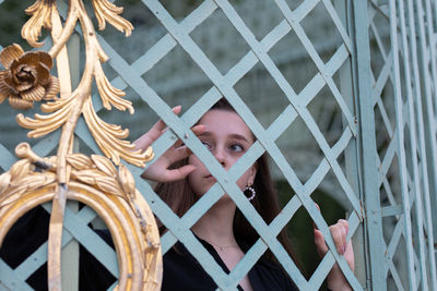 Close-up of young woman looking away