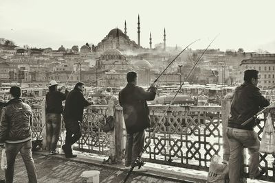 Tourists looking at eiffel tower