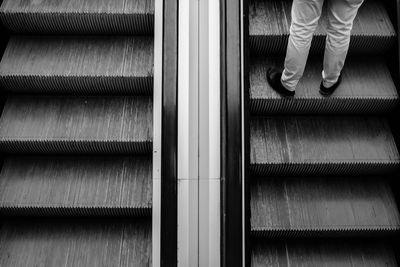 Low section of woman on tiled floor