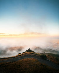 Scenic view of landscape against sky during sunset