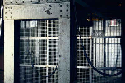 Close-up of metal grate window