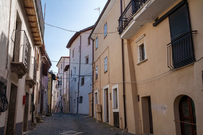 Alley amidst buildings in town