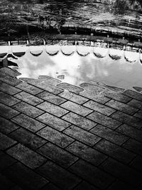 Reflection of swimming pool in lake