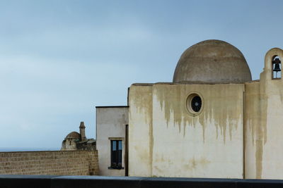 Low angle view of old building against sky