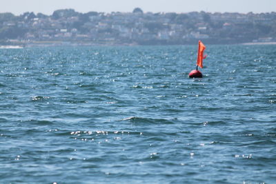 Man swimming in sea