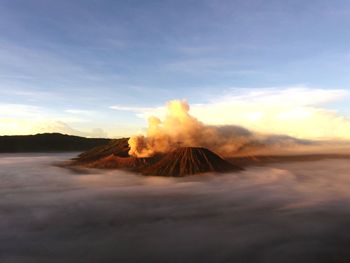 Scenic view of volcanic mountain against sky