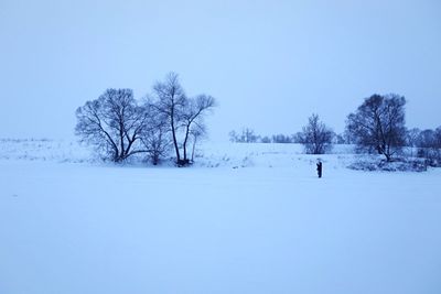 Scenic view of snow covered landscape against sky