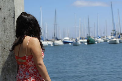 Rear view of woman looking at sea