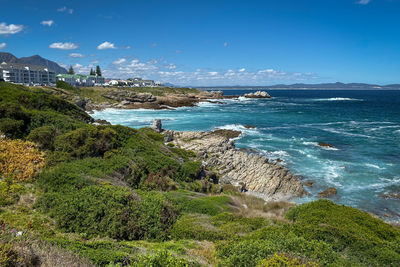 Panoramic view cityscape of hermanus seen from cliff path coastal trail, south africa