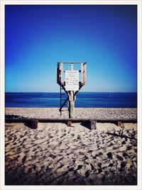 Scenic view of sea against blue sky