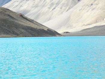 Scenic view of sea against mountains